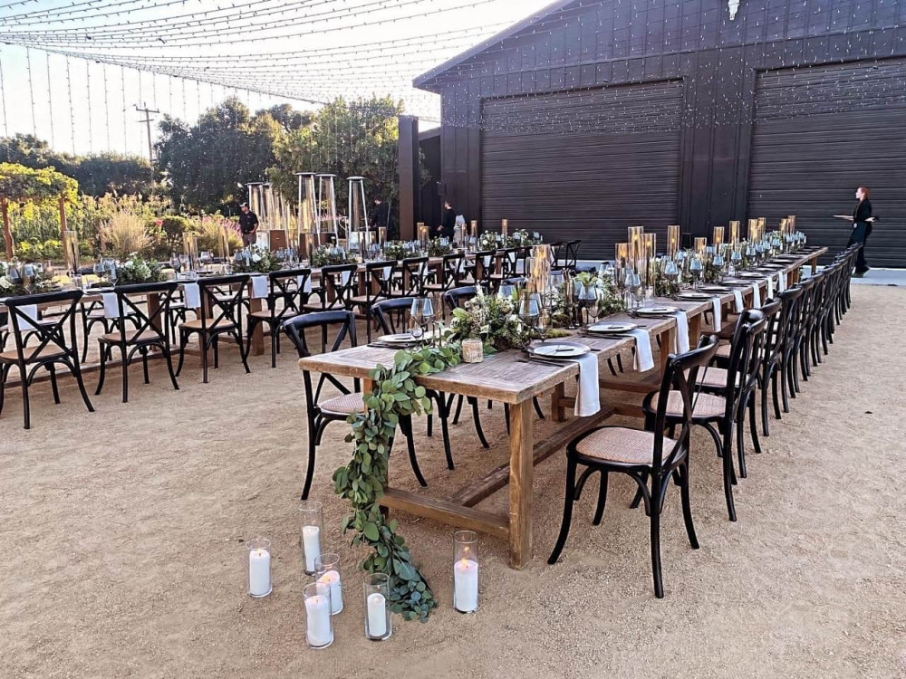 tables in front of barn