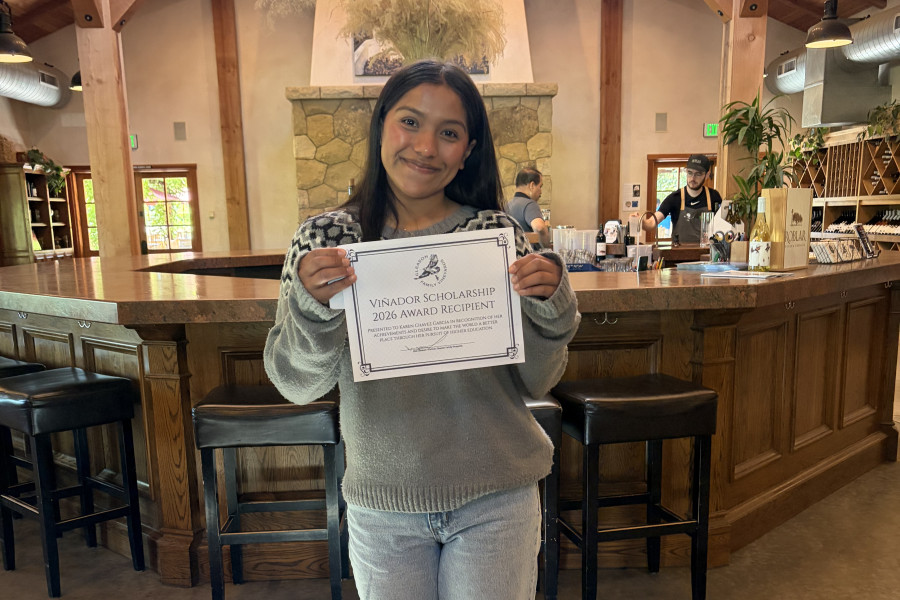 Karen holding certificate